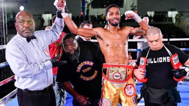 Ardreal Holmes Jr. celebrates his USBA super welterweight championship win over Marlon Harrington at the Wayne State Filed House in Detroit, Michigan. ADAM J. DEWEY/SALITA PTOMOTIONS.